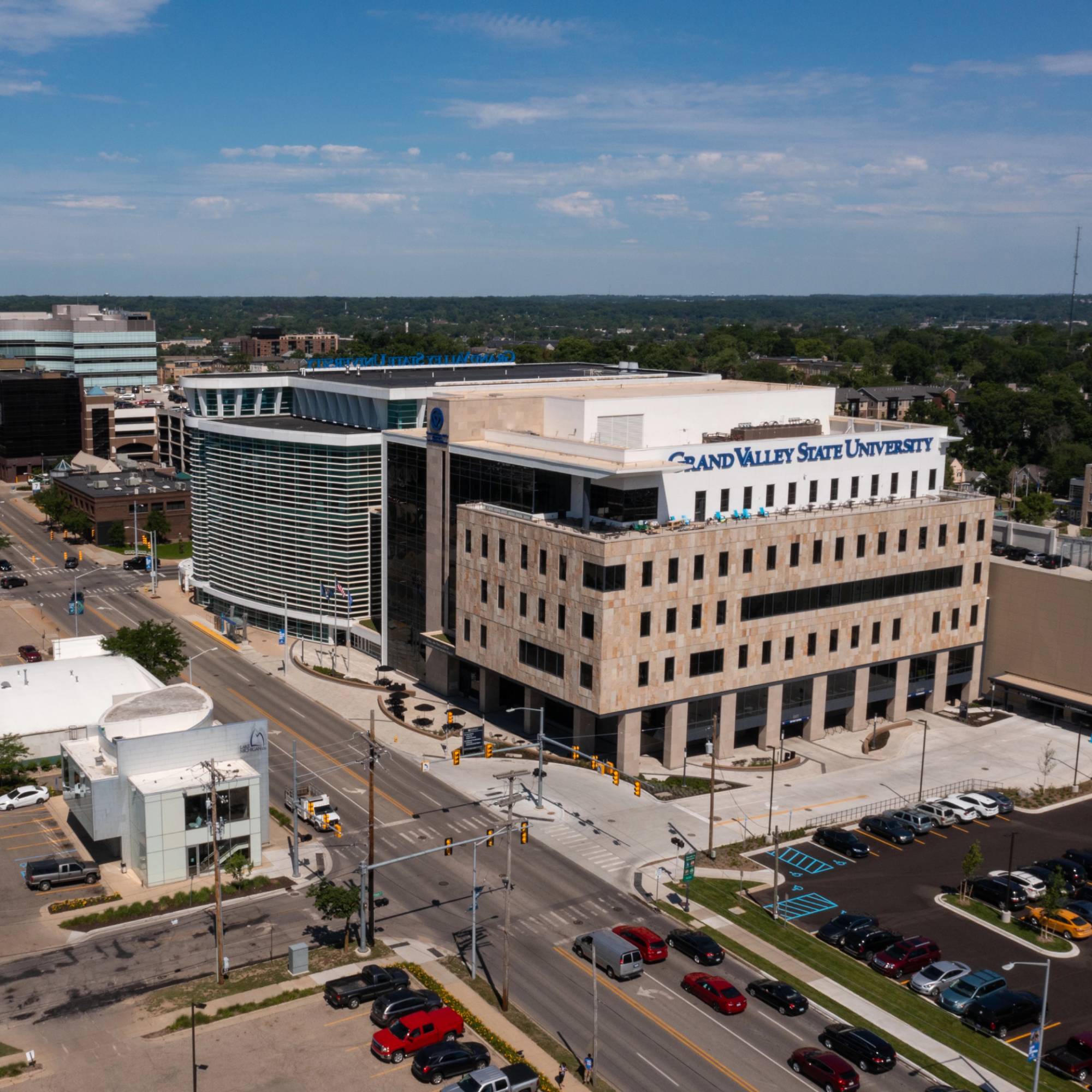 The downtown DeVos Center for Interprofessional Health building is displayed.